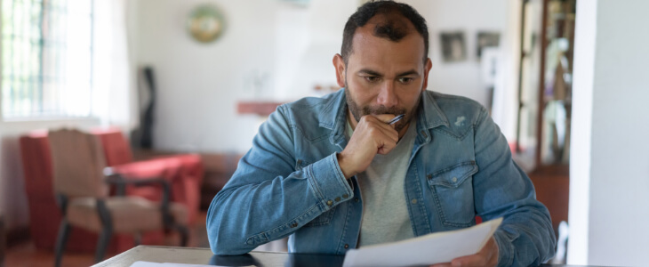 image of man worried about his bills